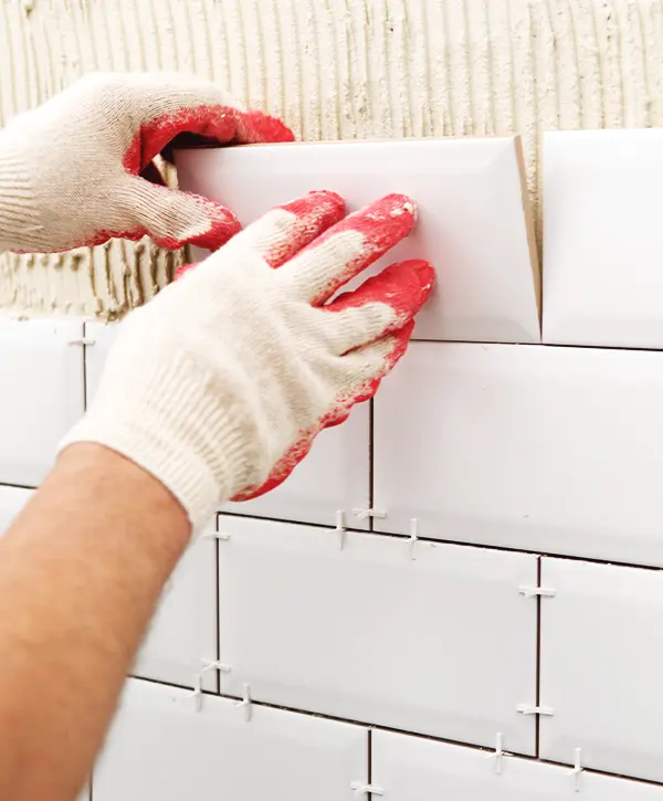 worker from baileys remodeling installing tile wake forest