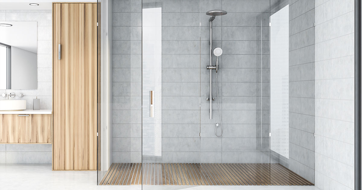 White tile bathroom interior with shower